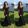 2021 Sexy Arabic Black Prom Party Dress Jewel Neck Illusion Lace Appliques Crystal Beaded Mermaid Long Sleeves Formal Evening Gowns