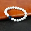 새로운 디자인 팔찌 10pcs / lot 8mm Hematite 로얄 크로스 예수님 팔찌와 최고 품질 화이트 Howlite 스톤 비즈