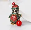 Spille a forma di pinguino di cartone animato con strass multicolori in oro vintage. Spilla per animali in lega d'oro anticata. Regali per feste