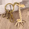 Exquisite Mini Brons Roestvrijstalen Sleutelhanger Personalized Creative Retro Sleutelhanger Pendant Kr031 Sleutelhangers Mix Order 20 stuks veel