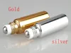 10st / lot Gratis frakt 5ml Metal Roller Refillerbar flaska för eteriska oljor UV-rullade glasflaskor Guld silverfärger