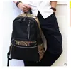 حقيبة جلدية جديدة تمامًا مموهة مموهة حقيبة ظهر للأزياء اللون