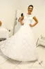 Arabskie rocznika koronki suknie ślubne aplikacja suknie ślubne linia patrz przez przyciski suknie ślubne z powrotem arabski Dubai Vestidos de Novia
