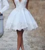 حبيبته قصيرة قصاصة شاطئية الدانتيل فستان الزفاف الجديد جديد فساتين الزفاف المخصصة الحجم يدويًا مصنوعة يدويًا بيع أزياء رومان 158G