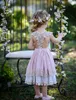 Kant applique bloem meisje jurken met boog Mooie tiered meisjes jurken voor bruiloft katoen communie jassen