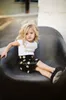 Vestiti per madre e figlia Abiti estivi Abiti per neonate Completi per bambini Abiti lettera T-shirt bianca Tops gonna a pois Set per bambini w9739820