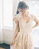 Elegant Garden Country Wedding Dresses 2017 Champagne Tulle spets Appliqued Capped Sleeve Reem Acra Bridal klänningar Custom Made8119509
