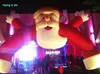 Outdoor Christmas Inflatable Santa Archway 8m Red Air Blown Santa Waving Hands With Custom Printing For Doorway Decoration