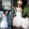 2017 New Mermaid Dresses Lace Appliques Illusion Off Shoulder Long Sleeves Tulle Plus Size Chapel Train Wedding Dress Bridal Gowns