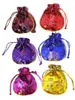 Dragon Phoenix Patronen Kleine Gift Bag Sieraden Trinket Snoep Thee Lavendel Verpakking Pouch Trekkoord Chinese Zijde Brocade Pocket 50pcs / lot