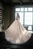 샴페인 A- 라인 웨딩 드레스 레이스 Applique 웨딩 드레스와 Bateau 긴 소매 계층화 된 프릴 사용자 지정 만든 된 신부 드레스 긴 기차