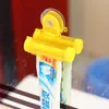Großhandel- 5 Farben Kunststoff Rolling Rohr Squeezer Nützlicher Zahnpasta Easy Spender, Badezimmer Zahnpastahalter, Badezimmerzubehör
