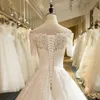 Nouveau 100% réel Arrived Photos Charme A-ligne robe épaule en dentelle de mariée manches courtes perles appliques robe de mariée Tie Up