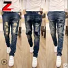 Wholesale- High Quality 2017 Fashion Ripped Patch Jeans Men Vintage Designer Pencil Pants Moustache Effect Hip Hop Casual troursers