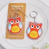 bomboniera e regalo per baby shower: "HOO-ray!" Gli omaggi di compleanno di Keychain del gufo favoriscono 100 pz/lotto