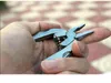 Portable Multi Function Folding Pocket Tools Plier Knife Keychain Skruvmejsel Multi-Purpose Combination Twiers Multi-Function Survival Tools