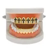 グリル帽のための新しい金メッキアイスアウト黒CZラインストーンのヒップホップの歯の歯の歯底底グリルセット吸血鬼の歯