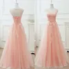 Gorgeous Blush Różowy Prom Sukienka Linia Sheer Neck Bez Rękawów Koronki Aplikacje Corset Prom Dresses Lace-up Otwórz tył Tanie wieczorowe suknia