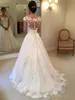 2018 Una línea Vestidos de novia Apliques de encaje baratos Ilusión Cap Mangas Barrido Tren País Botón Volver Vestidos formales Vestidos de novia personalizados