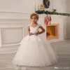 Sprzedam jak Hot Cakes Princess White Tulle Koronki Tutu Suknia Balowa Długa Kwiat Girl Dresses Profesjonalne niestandardowe rozmiary sukni