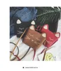 Śliczne koty torby dla dzieci koreańskie ucha księżniczka mini dzieci torba komunikatorowa moda moda zwykła zmiana torebka dla dzieci torebka c2389