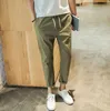 Envío gratis Verano más nuevo nueve Pantalones de hombre algodón y lino pies Harlan Slim tendencia ropa de cama casual PM001 Pantalón para hombre