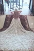 Robes de mariée sirène en dentelle de luxe avec train détachable 2017 date pure cou manches longues robes de mariée appliques boutons arrière robes