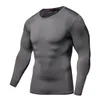 Camicia a compressione Fitness Abbigliamento sportivo Solid Crossfit Bodybuilding Maniche