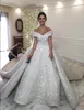 Abiti da sposa di lusso con spalle scoperte 2018 Primavera Estate Appliques di pizzo Perline Una linea Abiti da sposa Corte dei treni Abito da sposa Arabo Vestido