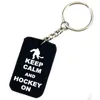 50 pièces garder le calme et le Hockey sur l'étiquette de chien en Silicone porte-clés Logo en creux rempli de cadeau de Promotion de couleur