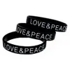 Bracciale in gomma siliconica Love and Peace da 100 pezzi con logo stampato nero per regalo di promozione di attività di fondazione di beneficenza