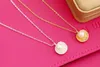 Mode simple perle coquille pendentif court collier femme clavicule collier or argent plaqué gros en gros