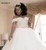 Abiti da sposa con perline di lusso con scollo a cuore e spalline scoperte Abiti da sposa africani Abito da sposa lungo in tulle gonfio con applicazioni