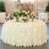 Decorazioni per la tavola di nozze fatte a mano con gonna a balze romantiche di alta qualità Decorazioni di stoffa per torta organizzate in avorio bianco su misura