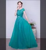Turquoise Tulle Aline Long Modest Prom Vestidos con mangas cortas Cristales con cuentas elegantes vestidos de fiesta de mujeres formales reales 2242133