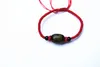 Bracelet en pur tissage manuel sculpté noir - agate rouge jacquier coeur sutra.