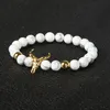 Groothandel 10 stks / partij 8mm White Howlite Marmeren Stone Kralen met Legering Stierengevecht Armband Menwomen Animal Charm Sieraden