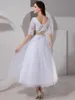 Vestidos de novia de longitud de té con medias mangas Escote en V 1/2 manga Apliques de encaje blanco Vestidos de novia Vestido de tul de una línea con faja de champán