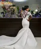 2022 Luxuriöse afrikanische Meerjungfrau-Hochzeitskleider mit langen Ärmeln, Stehkragen, Illusion, Spitze, Applikationen, Kristallperlen, durchsichtig, Übergröße, individuelle Brautkleider