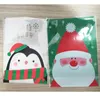 Partihandel-10pcs Santa Claus Christmas Gift Treat Påsar Plastkakor Biscuits Candy Packaging Bag Birthday Party Wedding Favor