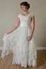 Jurken Vintage Lace Aline bescheiden trouwjurken met mouwen V nekknoppen achterste vloer lengte jaren 1950s bruidsjurken goedkope nieuwe aankomst cust