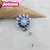 Пользовательские кольца кольца ювелирные украшения хрустальный ванна с голубым цветочным кнопкой выдвижной кнопкой
