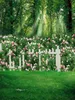 春の花の庭の背景緑の草原ホワイトフェンスの花の背景森林の木子供子供の風光明媚な写真の背景