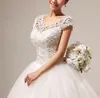 Helt nya bröllopsklänningar Gorgeous Ball Gown Cap Sleeves Princess Formell Klänning Vit / Elfenben Vestidos de Novia Elegant Bridal Gown