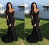 2021 Sexig Arabisk Svart Prom Party Dress Jewel Neck Illusion Lace Appliques Kristall Beaded Mermaid Långärmade Formella Aftonklänningar