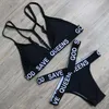 Großhandel Bademode Frau Sexy Bandage Bikini Set Sommer Bathsuit Kreuz Riemchen Push-Up Badeanzug God Save Queens Kostenloser Versand