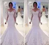 Nya moderna sjöjungfrun bröllopsklänningar Lång ärmar V Neck White Ivory Lace Applicques Pärled Court Train Sheer Back Custom Bridal Gowns 403