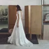 Lihi Hod Bohemian Lace Wedding Dresses Deep V Neck A Line Backless Beach Wedding Dress Floor Length Pleated Chiffon Boho Bridal Gowns