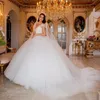 Lyxiga Kortärmas Super Ball Gown Bröllopsklänningar Jewel Sheer Chapel Tåg med Pärlor Beaded Backless Custom Made Vestidos de Novia