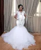 White Lace Appliques Sheer Neck Bröllopsklänningar Illusion Långärmade Sleeves Mermaid Tulle Bridal Gowns Sydafrikanska Bröllop Vestidos